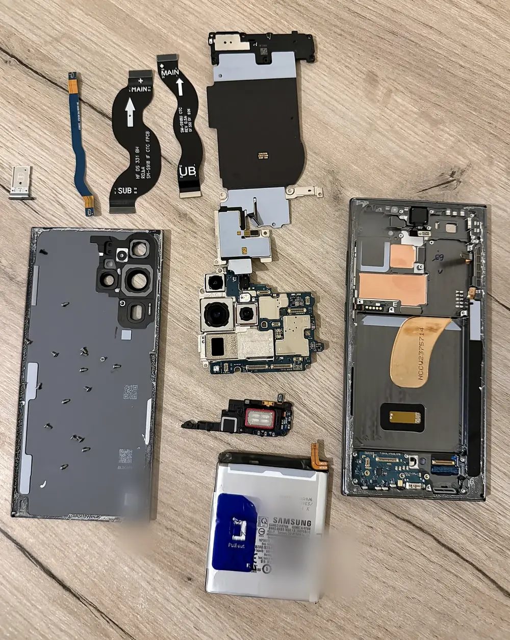 Real Samsung Galaxy S23 Ultra components laid out during disassembly
